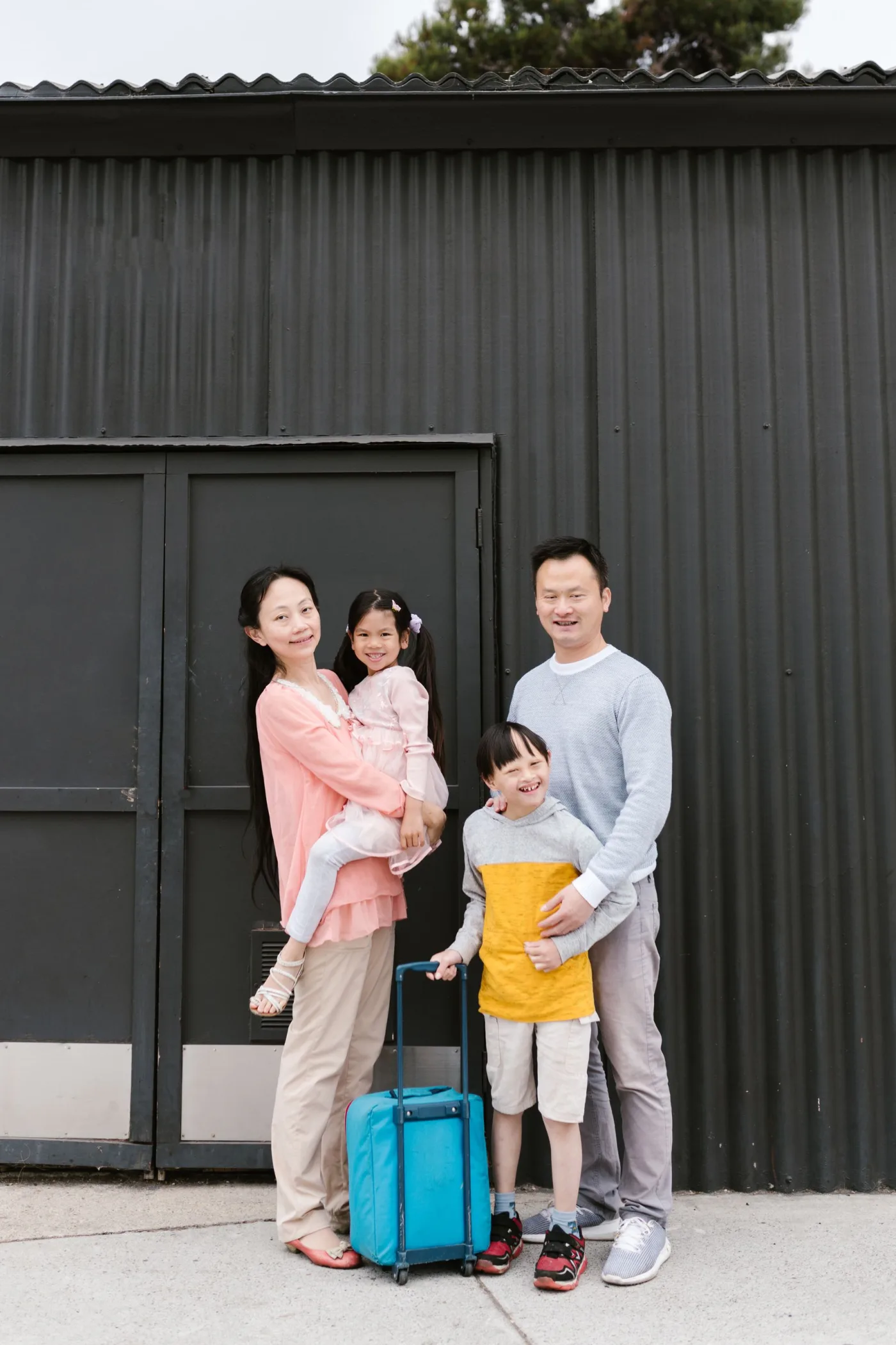 Asian family with children ready to travel together